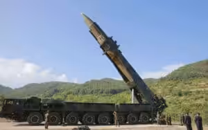 North Korea's leader Kim Jong-un inspects a ballistic missile. File photo.