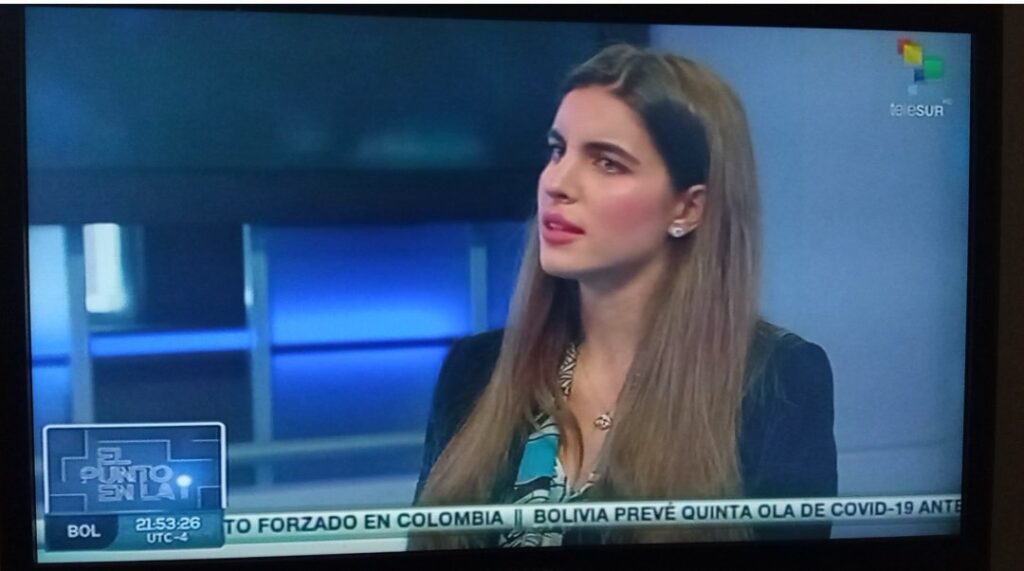 Camilla Fabri during an interview in Telesur on Monday, May 30. Photo: Twitter/@Lunita41.