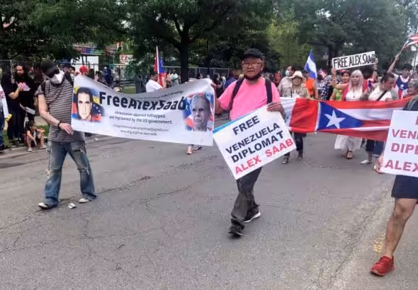 Chicago Free Alex Saab Committee contingent participating in the Puerto Rican People's Parade in Chicago, Saturday, June 11, 2022. Photos: Chicago Free Alex Saab Committee.