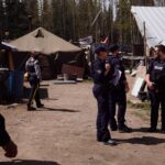 RCMP conducting a “site inspection” of a Wet’suwet’en village site. Gidimt’en Checkpoint.