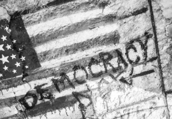 United States flag with the word democracy written on it. File photo.