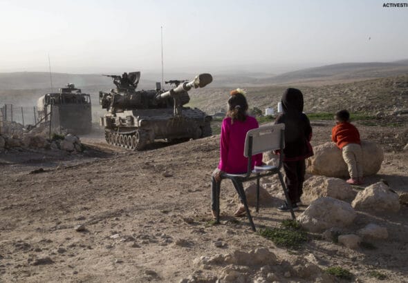 Israeli forces demolish Palestinian structures in Masafer Yatta. Photo: via ActiveStills.