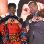 Now Vice President elected Francia Márquez (left) and President elected Gustavo Petro (right) doing the love hand sign in a public event. File photo: Colprensa.