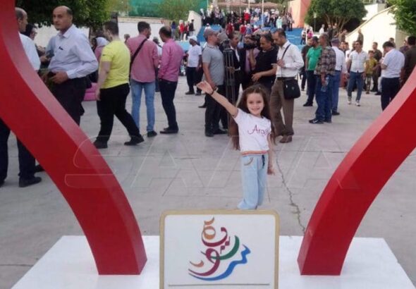 The photo shows visitors to the 42nd edition of Damascus International Flowers Fair in the Syrian capital on June 26, 2022. Photo by SANA.