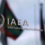 The logo of the International Atomic Energy Agency (IAEA) is seen outside the IAEA headquarters in Vienna, Austria, on March 1, 2021. Photo by Reuters.