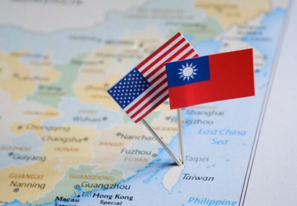 Map of Taiwan with two flags, a Taiwan and a US flag. Photo: Thekootneeti.in