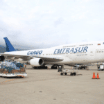 An EMTRASUR plane on the tarmac of Simón Bolívar International Airport, loading supplies headed for Suriname. Photo: Twitter/@CancilleriaVE