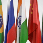 Flags and representatives of the BRICS countries and as well as those of other nations who aspire to join the group. Photo: AP.