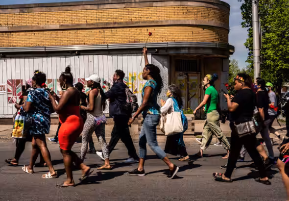 People in Buffalo, N.Y., march on May 15 after racist murder of 10 Black people.