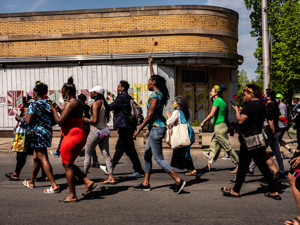People in Buffalo, N.Y., march on May 15 after racist murder of 10 Black people.