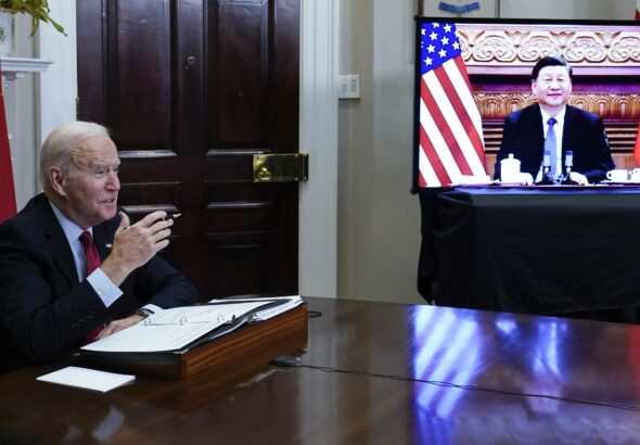 President Joe Biden meeting with Chinese President Xi Jinping virtually from the Roosevelt Room of the White House in Washington, Monday, Nov. 15, 2021. Photo: AP/Susan Walsh
