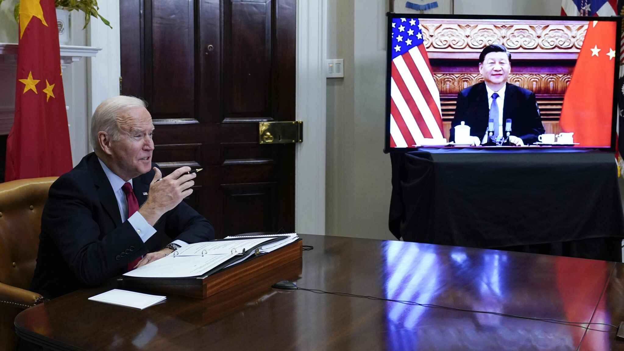 President Joe Biden meeting with Chinese President Xi Jinping virtually from the Roosevelt Room of the White House in Washington, Monday, Nov. 15, 2021. Photo: AP/Susan Walsh