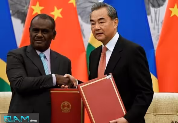 Foreign Minister Wang Yi and Solomon Islands Foreign Minister Jeremiah Manele meeting in 2019. Photo: Naohiko Hatta/Reuters