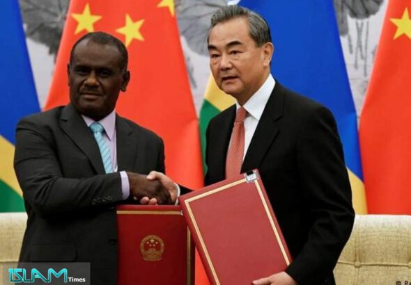 Foreign Minister Wang Yi and Solomon Islands Foreign Minister Jeremiah Manele meeting in 2019. Photo: Naohiko Hatta/Reuters