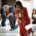 Nancy Pelosi and a group of US democratic party congress people kneel during a George Floyd memorial in 2020 in a very controversial photo op that did not go well. Photo: AFP via Getty Images.