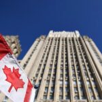 Ministry of Foreign Affairs of the Russian Federation, with the flag of Canada in the foreground. Photo: Sputnik.