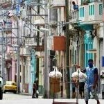 Cubans walking on a street in Havana. Photo: Yander Zamora/EPA/Shutterstock.