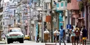 Cubans walking on a street in Havana. Photo: Yander Zamora/EPA/Shutterstock.