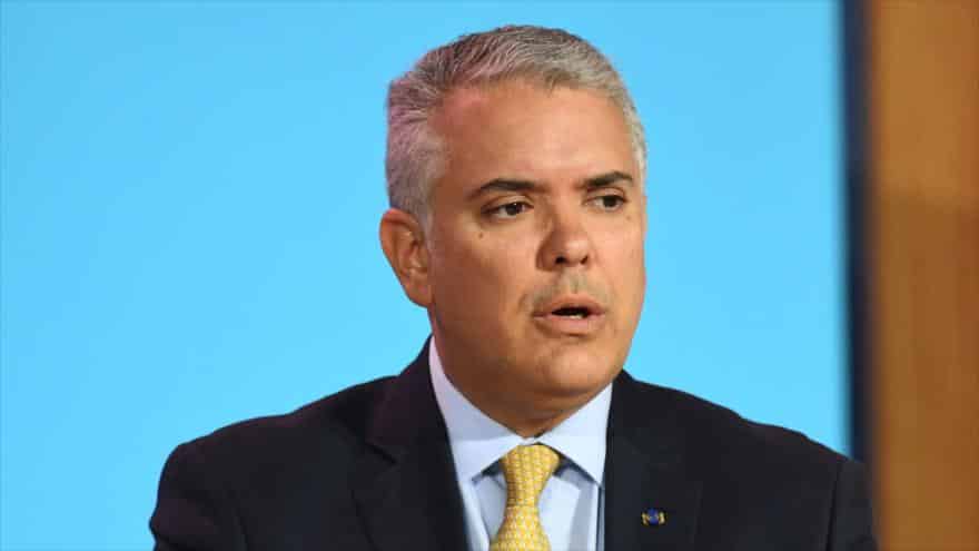 Colombian President Iván Duque speaks on the sidelines of the 9th Summit of the Americas, held in Los Angeles, on June 8, 2022. Photo: AFP.