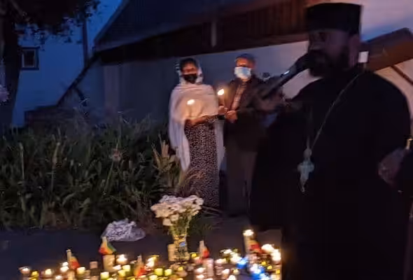 Candlelight vigil outside the Ethiopian Orthodox Tewahedo Mekane Selam Medhane Alem Cathedral in Oakland, California, for those who were killed in a massacre in Wellega, Oromia Region, Ethiopia on June 18. Photo: Black Agenda Report.