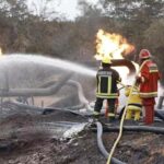 Firemen extinguishing some remaining flames on the site of sabotage. Photo: Twitter/@MinPetroleVE.
