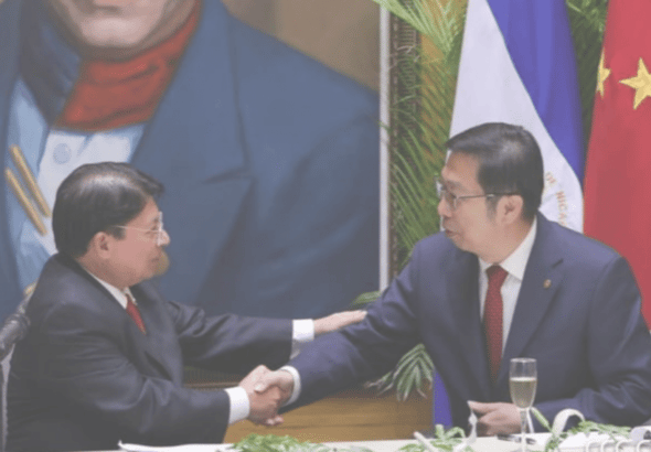 Nicaraguan Foreign Affairs Minister Denis Moncada shakes hands with the Ambassador of China in Nicaragua, Chen Xi. Photo: El19Digital.
