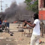 A Haitian street gang fighting in Port-au-Prince in 2021. Photo: Haiti Liberte