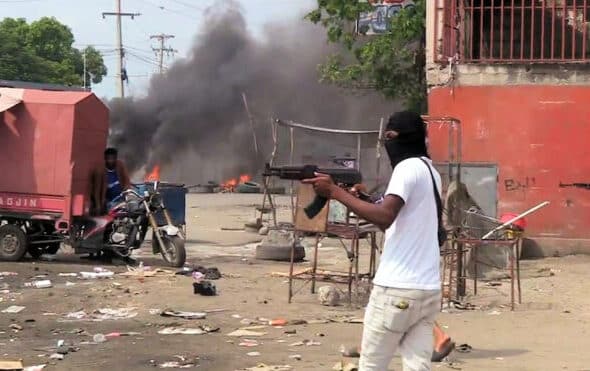 A Haitian street gang fighting in Port-au-Prince in 2021. Photo: Haiti Liberte