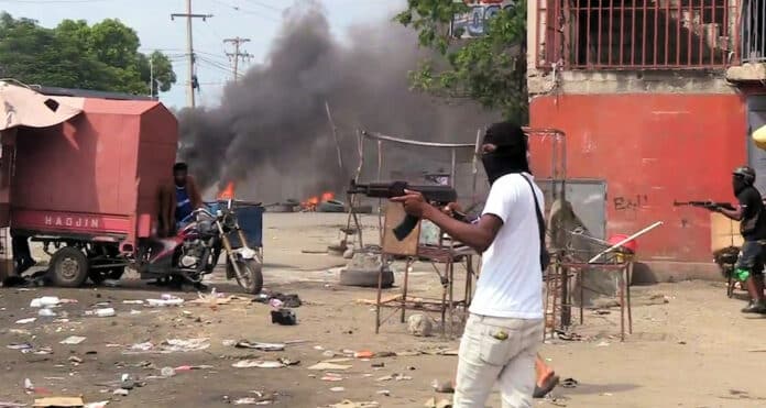 A Haitian street gang fighting in Port-au-Prince in 2021. Photo: Haiti Liberte