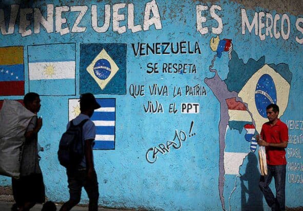 Street painting in Caracas showing a map of South America with the Mercosur countries and their flags. It reads "Venezuela is Mercosur." Photo: Reuters/Uslei Marcelino.