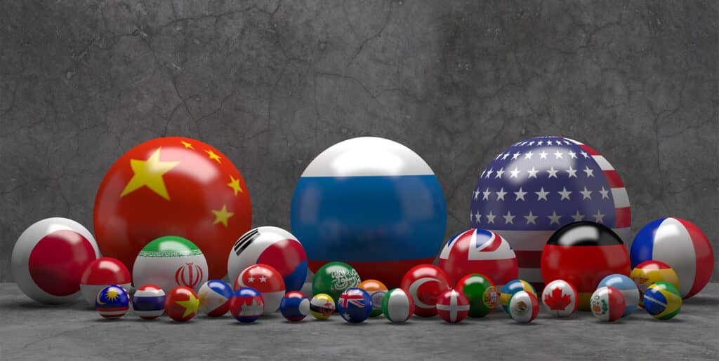 Photo composition showing pool balls with flags of different countries. China, Russia and the US are the biggest balls while Japan, India, South Korea, UK, Germany and France follow in size along 21 smaller flags. Photo: Russian International Affairs Council.