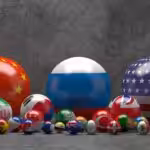 Photo composition showing pool balls with flags of different countries. China, Russia and the US are the biggest balls while Japan, India, South Korea, UK, Germany and France follow in size along 21 smaller flags. Photo: Russian International Affairs Council.