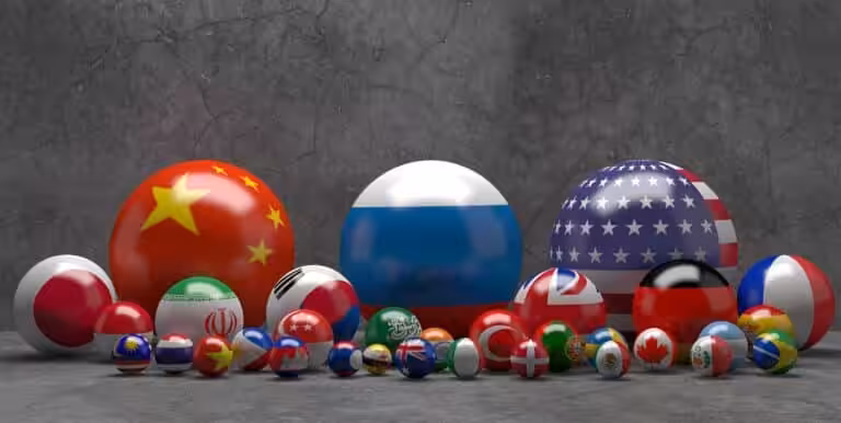 Photo composition showing pool balls with flags of different countries. China, Russia and the US are the biggest balls while Japan, India, South Korea, UK, Germany and France follow in size along 21 smaller flags. Photo: Russian International Affairs Council.
