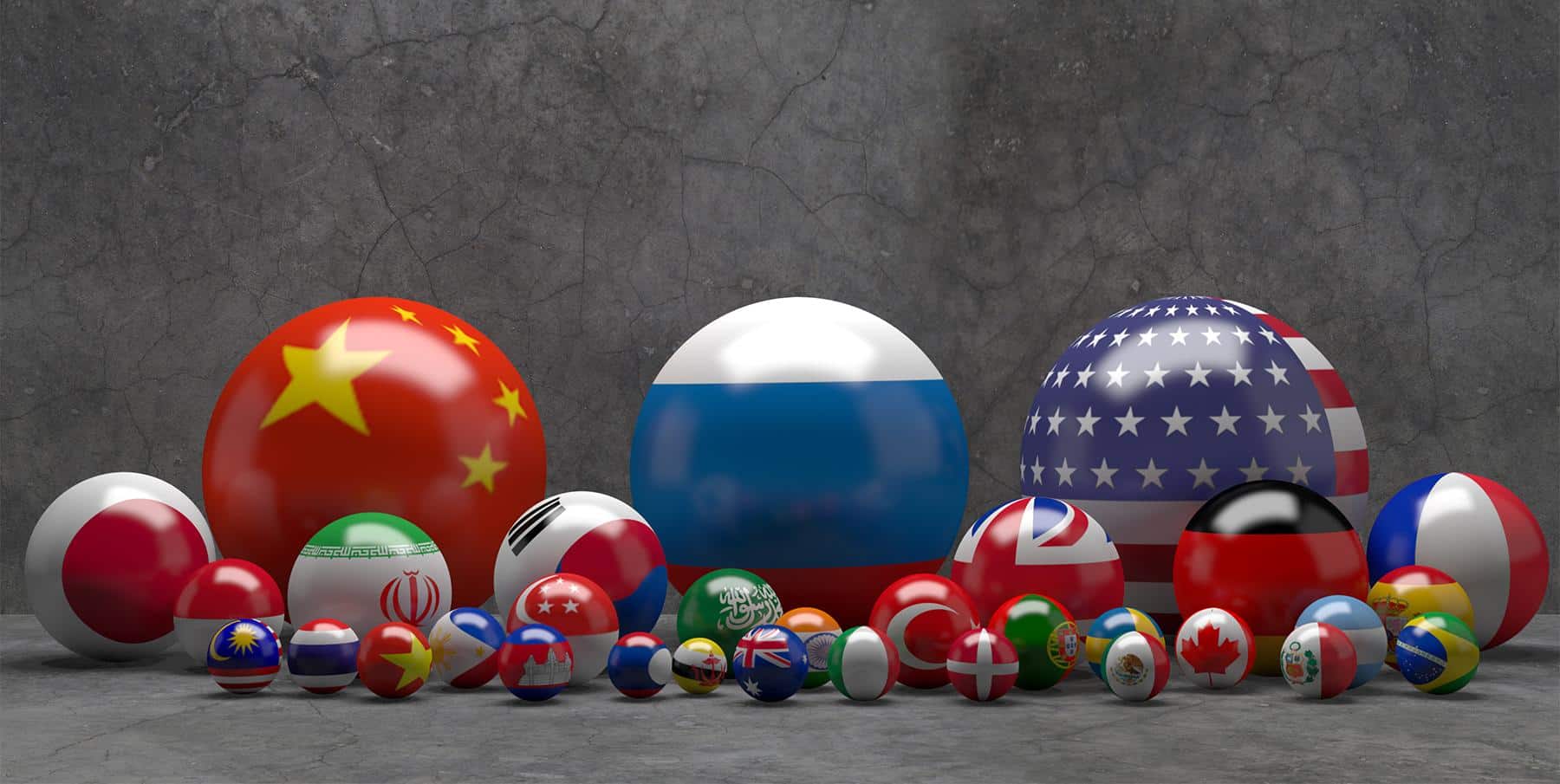 Photo composition showing pool balls with flags of different countries. China, Russia and the US are the biggest balls while Japan, India, SOuth Korea, UK, Germany and France follow in size along 21 smaller flags. Photo: Russian International Affairs Council.