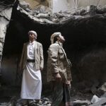 Houthi militants stand in the house of Houthi leader Yahya Aiydh, after Saudi-led air strikes destroyed it in Yemen's capital Sanaa September 8, 2015. Photo: Khaled Abdullah / Reuters