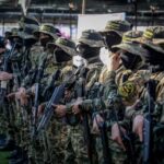 Members of Al-Quds Brigades, the military wing of the Islamic Jihad movement at a gathering for Islamic Jihad commander Khaled Mansour, who was killed on the first day of “Operation Breaking Dawn”, in Rafah, in the southern Gaza Strip, on August 8, 2022 (photo credit: ABED RAHIM KHATIB/FLASH90)