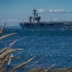US aircraft carrier passing through a strait. Photo: Globallookpress.com/USNavy.