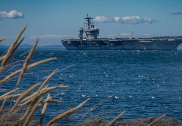 US aircraft carrier passing through a strait. Photo: Globallookpress.com/USNavy.
