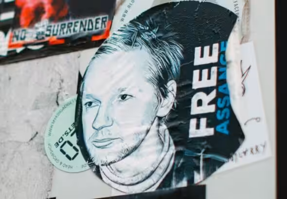 Banners displayed at a protest demanding freedom for Julian Assange, in Germany. Photo: Markus Spiske.