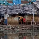 Children playing in a slum in Allahabad, India, October 3, 2011. Photo: AP.