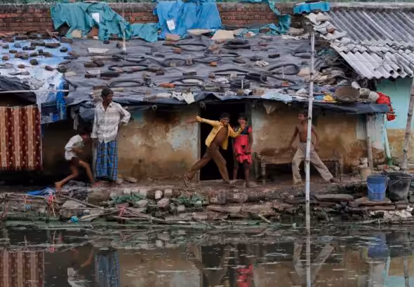 Children playing in a slum in Allahabad, India, October 3, 2011. Photo: AP.