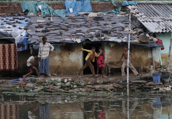 Children playing in a slum in Allahabad, India, October 3, 2011. Photo: AP.