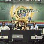 Eugene Puryear, author Ann Garrison, Rania Khalek, Dr. Simon Tesfamariam at the 48th annual Eritrea Festival in Dallas. Photo: Twitter @SebleTsehaye.