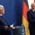 German Chancellor Olaf Scholz, right, with Palestinian Authority leader Mahmoud Abbas, at a press conference in Berlin on 16 August. Photo: Wolfgang KummDPA.