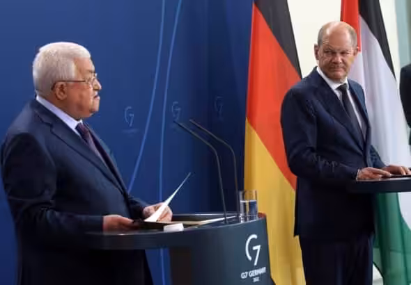 German Chancellor Olaf Scholz, right, with Palestinian Authority leader Mahmoud Abbas, at a press conference in Berlin on 16 August. Photo: Wolfgang KummDPA.