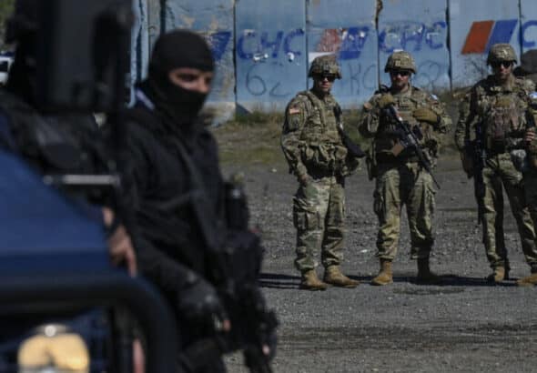 US NATO soldiers patrol next to Kosovo police near the border between Kosovo and Serbia on October 2, 2021. Photo: Armend Nimani/AFP.
