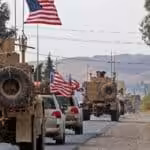 A US military convoy crossing from Syria into Iraq. Photo: USA Today.