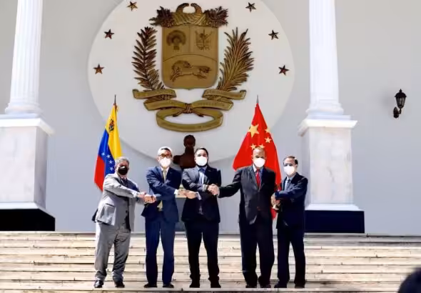 Venezuelan National Assembly Deputy Nicolás Maduro Guerra meets with the Director General for Latin America and the Caribbean of the Chinese Ministry of Foreign Affairs Cai Wai in Caracas. Photo: Twitter/@nicmaduroguerra