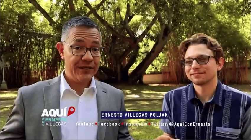 Venezuelan Minister for Culture Ernesto Villegas (left) and US writer Lucas Koerner (right). Photo: Aqui con Ernesto Villegas.