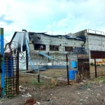 Burnt out detention center where Ukrainian prisoners of war were housed. Photo: Eva Karene Bartlett.